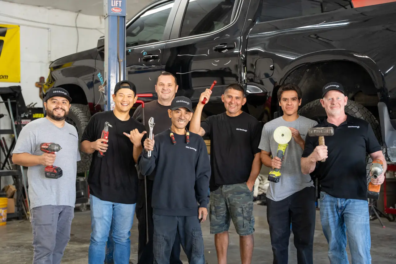 The G&G AutoBody team gathered in the shop